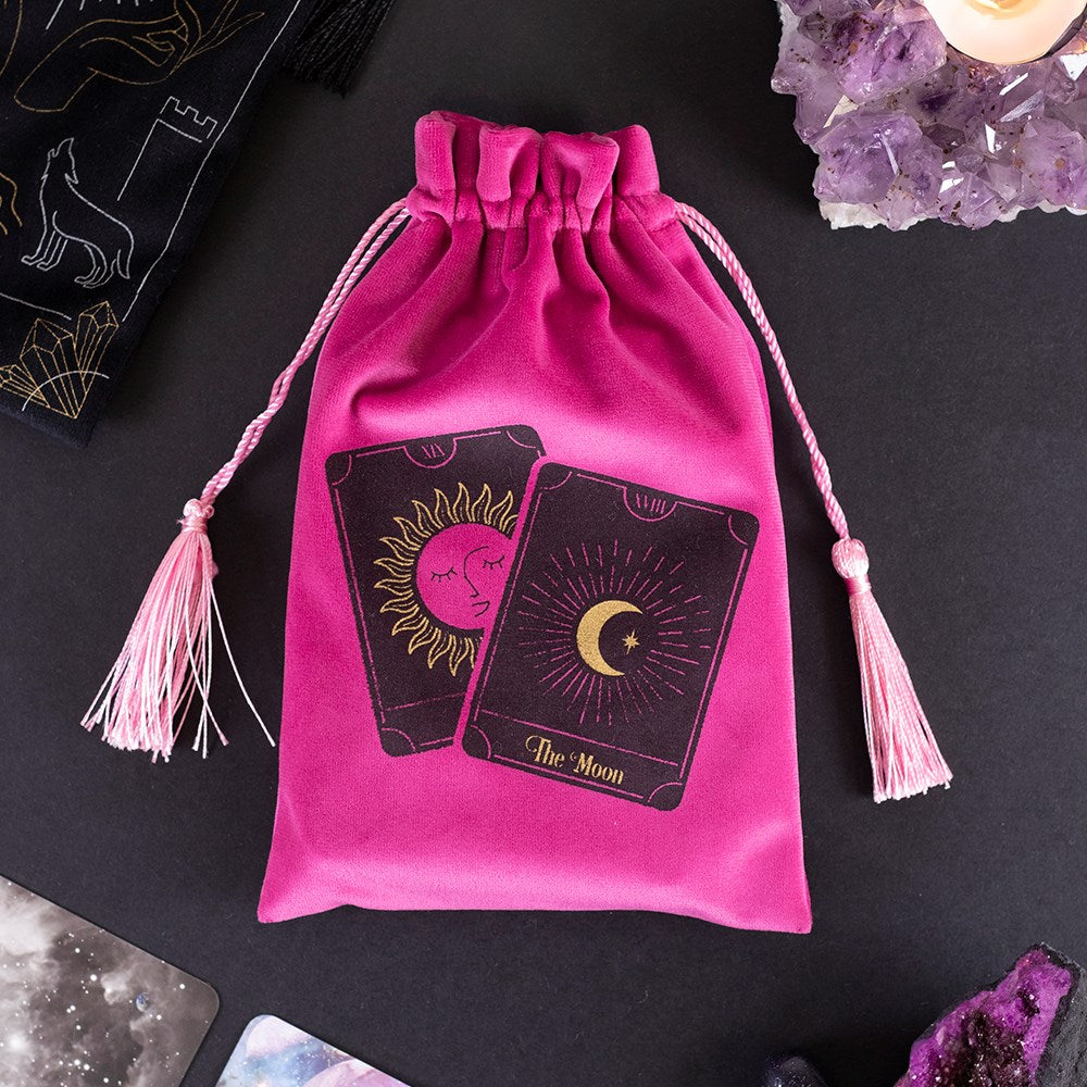 This velvet drawstring bag is the perfect place to keep tarot decks and oracle cards when not in use. Soft and luxurious with a stunning black and gold illustration of sun and moon tarot cards on the front. Designed by Something Different and part of 'The Fortune Teller' range of mystical gifts and home decor. 